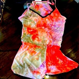 Lounge wear with adjustable straps. Lace at bottom and top